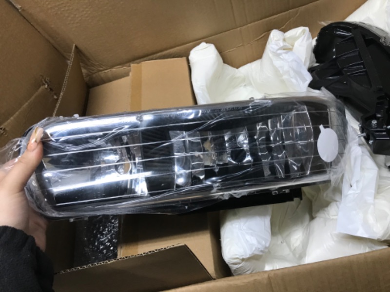 Photo 1 of DWVO Headlight Assembly Compatible with 1999-2002 Chevy Silverado / 2000-2006 Chevrolet Tahoe Suburban with Bumper Lights Clear Reflector Black Housing
