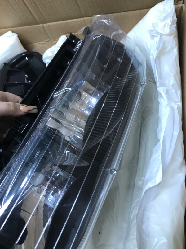 Photo 1 of DWVO Headlight Assembly Compatible with 1999-2002 Chevy Silverado / 2000-2006 Chevrolet Tahoe Suburban with Bumper Lights Clear Reflector Black Housing
