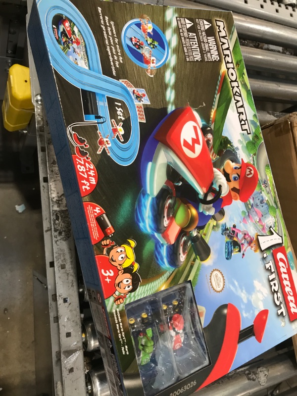 Photo 2 of Carrera First Mario Kart - Slot Car Race Track With Spinners - Includes 2 Cars: Mario and Yoshi - Battery-Powered Beginner Racing Set for Kids Ages 3 Years and Up Mario Kart w/ Spinners