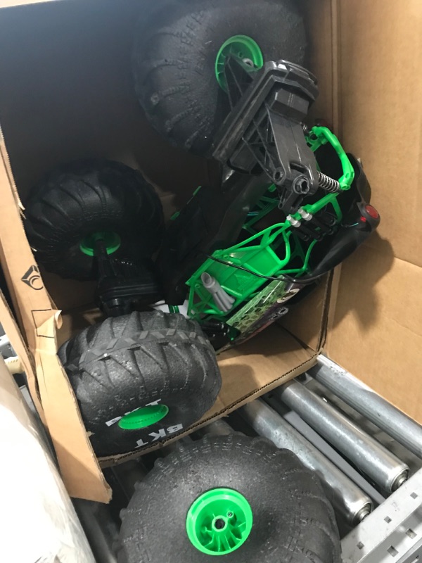 Photo 4 of **FRONT DRIVER TIRE BROKEN,  SEE PHOTO**
Monster Jam, Official Mega Grave Digger All-Terrain Remote Control Monster Truck with Lights, 1: 6 Scale, Kids Toys for Boys

