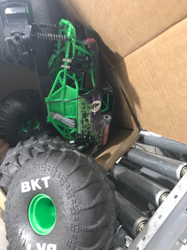 Photo 3 of **FRONT DRIVER TIRE BROKEN,  SEE PHOTO**
Monster Jam, Official Mega Grave Digger All-Terrain Remote Control Monster Truck with Lights, 1: 6 Scale, Kids Toys for Boys
