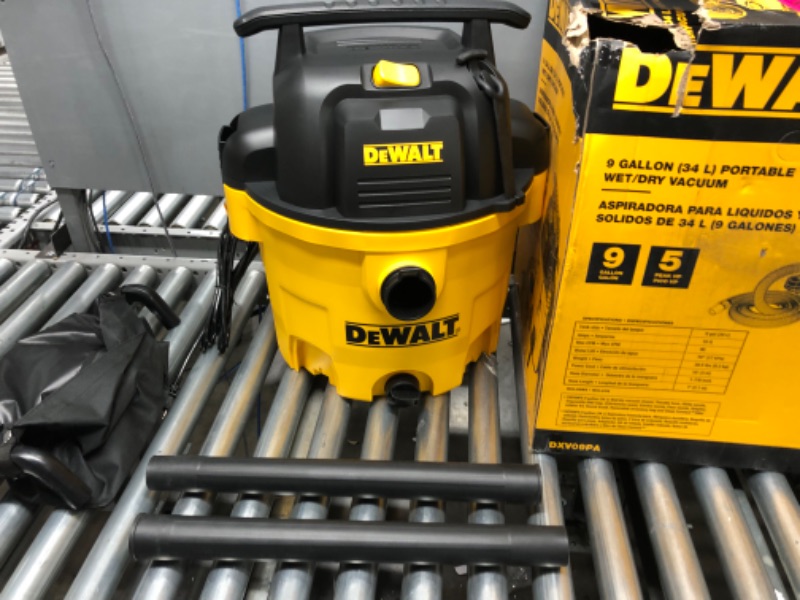 Photo 2 of DEWALT 9 Gallon Wet/Dry Vac, 5HP Heavy-Duty Shop Vacuum, Wet/Dry Suction Blow Function 3 in 1, DXV09P
HOSE INSIDE VACUUM
