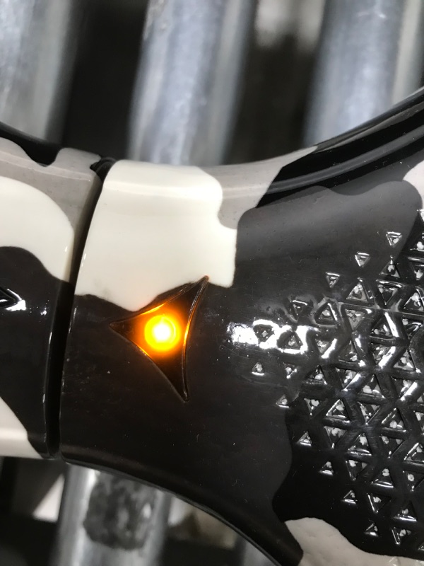 Photo 1 of Hover-1 Helix Electric Hoverboard | 7MPH Top Speed, 4 Mile Range, 6HR Full-Charge, Built-in Bluetooth Speaker, Rider Modes: Beginner to Expert Hoverboard Camo