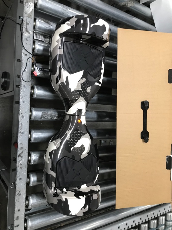 Photo 1 of Hover-1 Helix Electric Hoverboard | 7MPH Top Speed, 4 Mile Range, 6HR Full-Charge, Built-in Bluetooth Speaker, Rider Modes: Beginner to Expert Hoverboard Camo