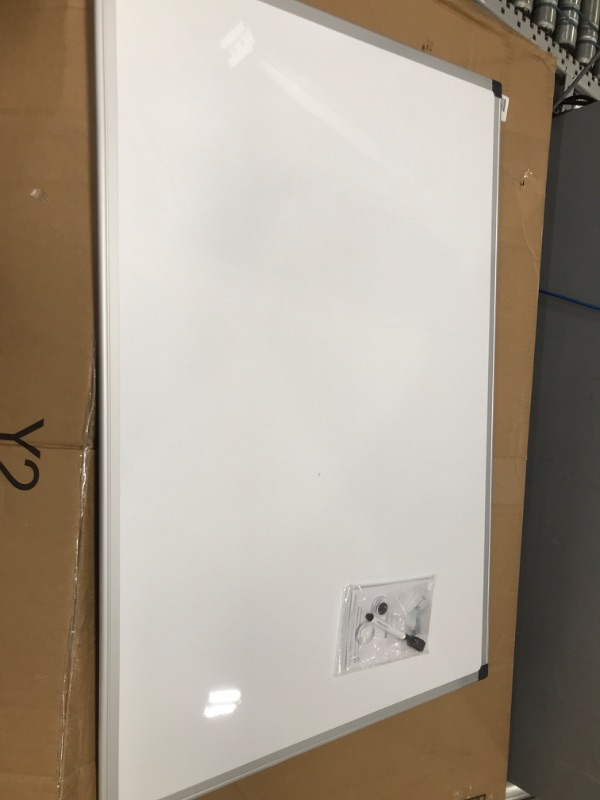 Photo 2 of Amazon Basics Magnetic Dry Erase White Board, 36 x 24-Inch Whiteboard - Silver Aluminum Frame 24" x 36" Magnetic, Aluminum Frame