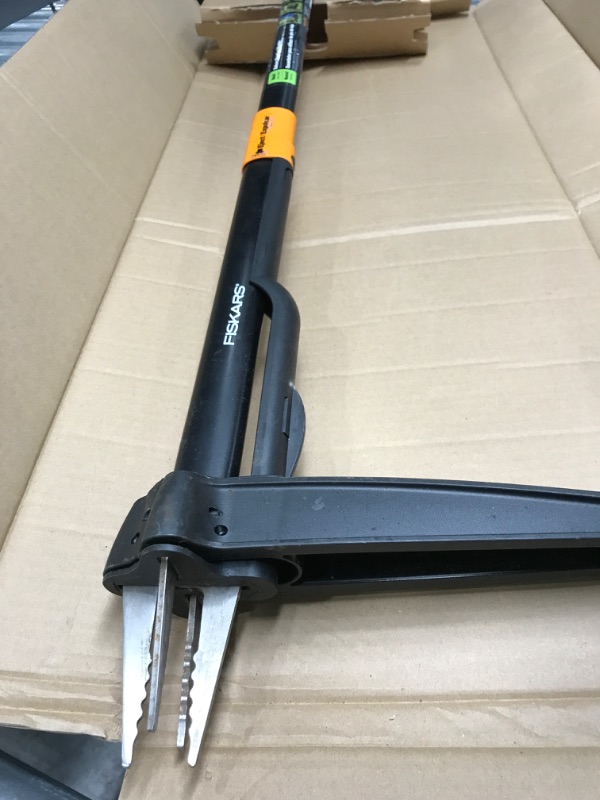 Photo 1 of Fiskars 339950-1002 4-Claw Weeder, 39 Inch