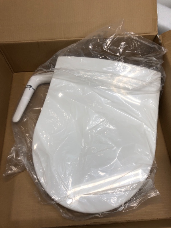 Photo 3 of *Loose Hardware/Possibly Missing* Kohler 76923-0 Puretide Toliet Seat, Round Manual Non Electric Bidet with Adjusting Spray Pressure and Position, Quiet-Close Lid, White White Round Toilet Seat