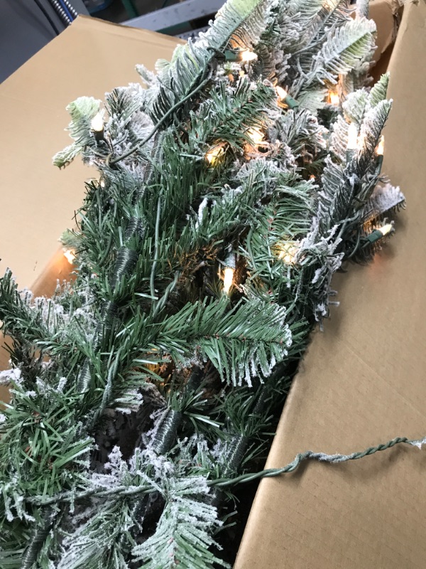 Photo 4 of *** LIGHTS UP*** Puleo International 7.5 Foot Pre-Lit Slim Flocked Aspen Fir Artificial Christmas Tree with 450 Clear Lights 7.5' Slim Flocked Aspen Fir with 450 Clear Lights Christmas Tree