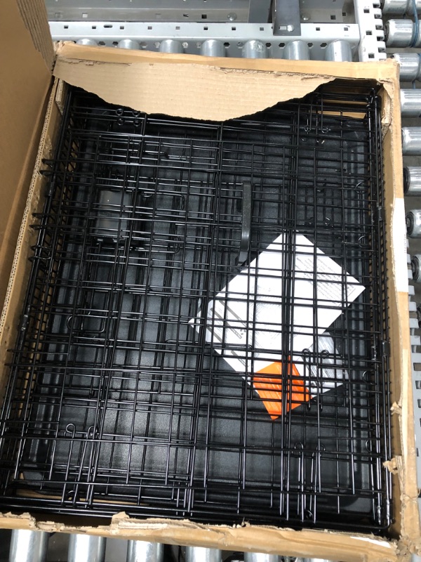 Photo 1 of Amazon Basics Foldable Metal Wire Dog Crate with Tray, Single Door, 24 Inch 24" Single Door w/ Divider Crate