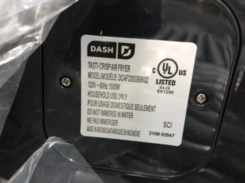 Photo 2 of ***DAMAGED*** DASH Tasti-Crisp™ Electric Air Fryer Oven Cooker with Temperature Control, Non-Stick Fry Basket, Recipe Guide + Auto Shut Off Feature, 1000-Watt, 2.6Qt, Black 2.6 Qt Black