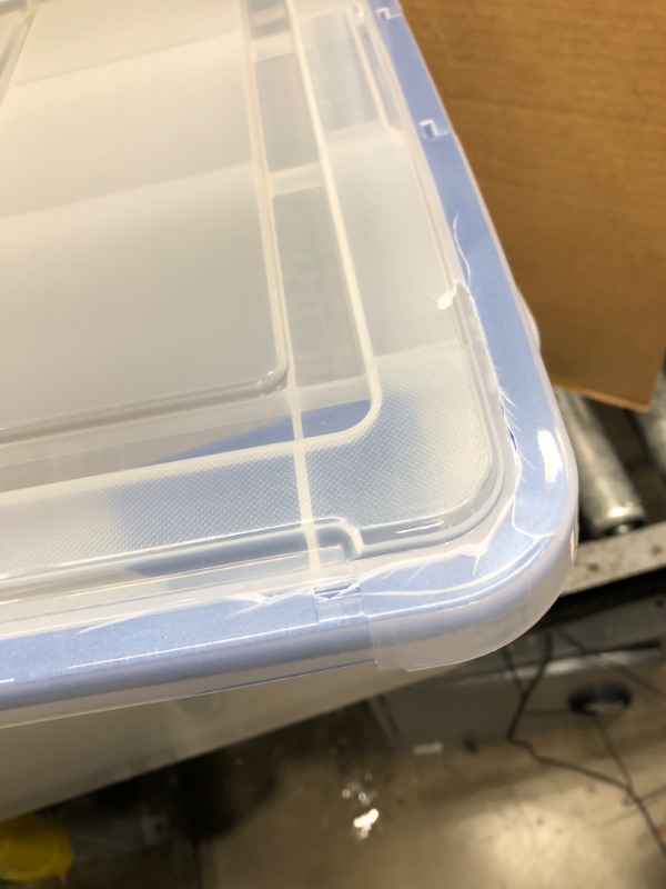 Photo 3 of *Minor Damage to One Lid-See Last Photo* IRIS USA 60 Quart WEATHERPRO Plastic Storage Box with Durable Lid and Seal and Secure Latching Buckles, Clear With Blue Buckles, Weathertight, 3 Pack 60 Quart - 3 Pack