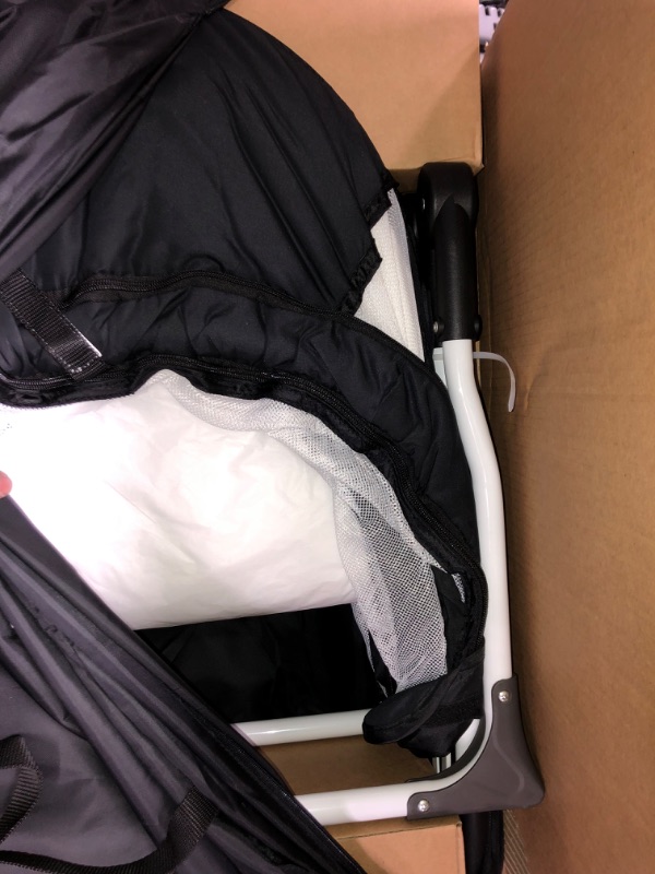 Photo 1 of Dream On Me Karley Plus Portable Quick Fold Bassinet with Removable Canopy in Black