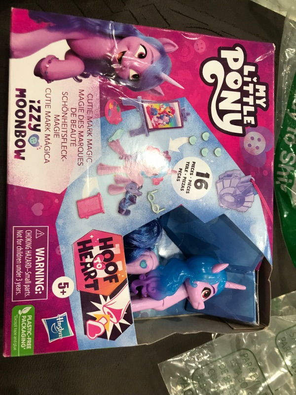 Photo 2 of My Little Pony: Make Your Mark Toy Cutie Mark Magic Izzy Moonbow - 3-Inch Hoof to Heart Pony with Surprise Accessories, Kids Ages 5 and Up