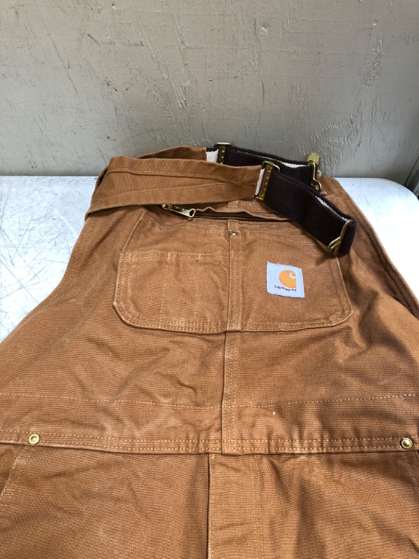 Photo 2 of Carhartt Unlined Duck Bib Overalls(USED)(MINOR STAINS)
SIZE 36 X 34