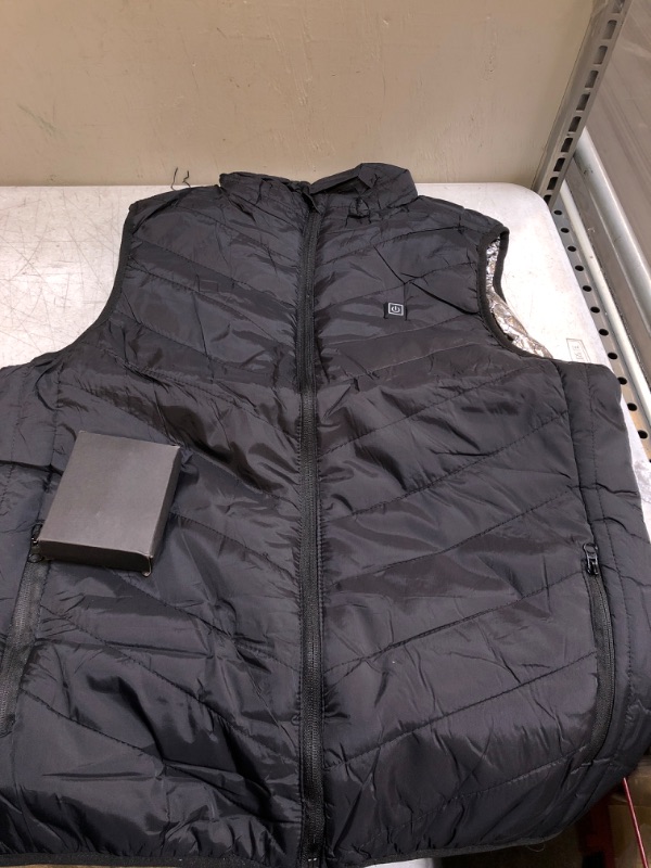 Photo 2 of WOMENS HEATED VEST 
SIZE LARGE 
NO BATTERY