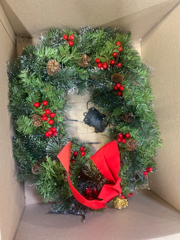 Photo 2 of 24" Artificial Christmas Bow Wreath with 15” Hanger, 50 LED Lights, Red Berries, Pine Cones & Pine Needles for Front Door, Windows, Living Room, and Indoor and Outdoor Christmas Decorations

