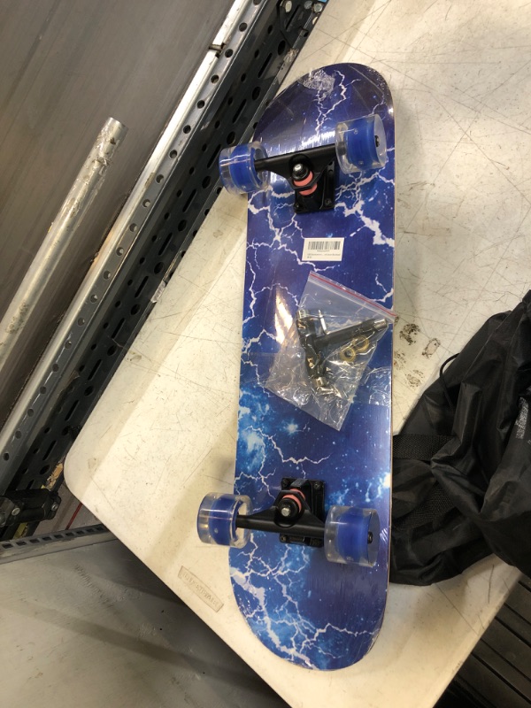 Photo 1 of GIEEU Skateboards with Colorful Flashing Wheels for Beginners,Kids,Teens,Adults,31 x 8 Inch Complete Standard Skate Boards 9 Layer Canadian Maple Deck Concave Skateboard 1-Lighting