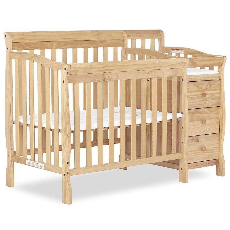 Photo 1 of Dream On Me Jayden 4-in-1 Mini Convertible Crib And Changer in Natural, Greenguard Gold Certified, Non-Toxic Finish, New Zealand Pinewood, 1" Mattress Pad
