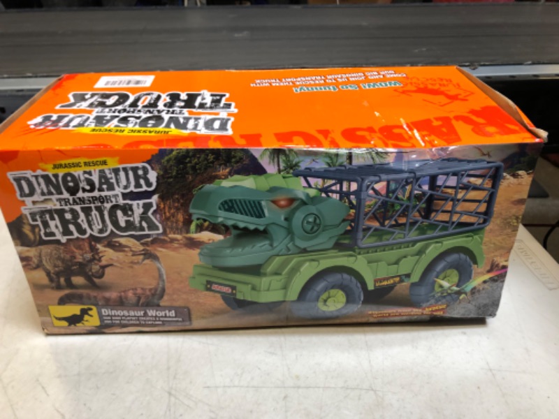 Photo 1 of JURASSIC RESCUE DINOSAUR TRANSPORT TRUCK 
++BOX SLIGHTLY DAMAGED, FACTORY SEALED++