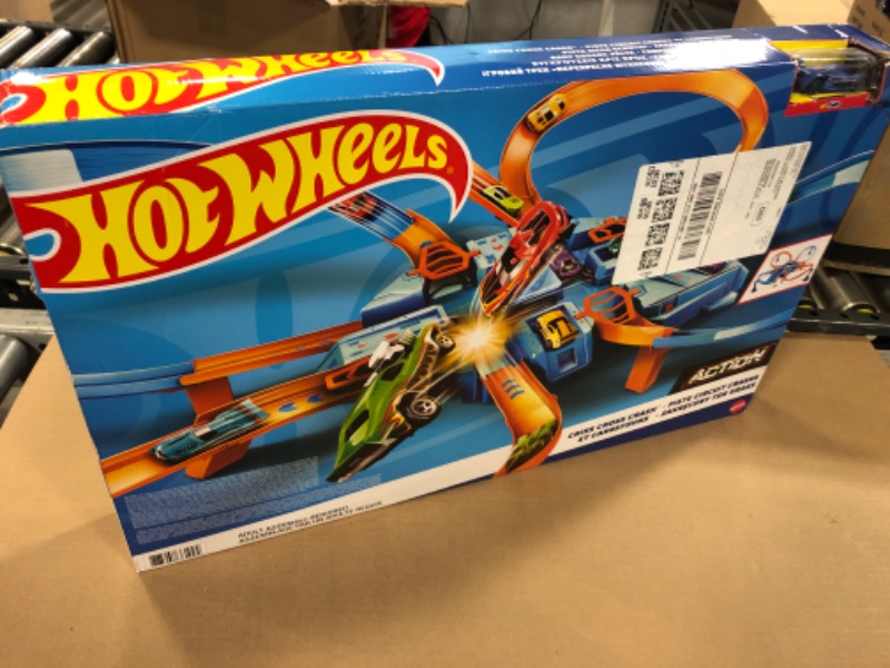 Photo 2 of Hot Wheels Track Set with 1:64 Scale Toy Car, 4 Intersections for Crashing, Powered by a Motorized Booster, Criss-Cross Crash Track????----factory sealed 