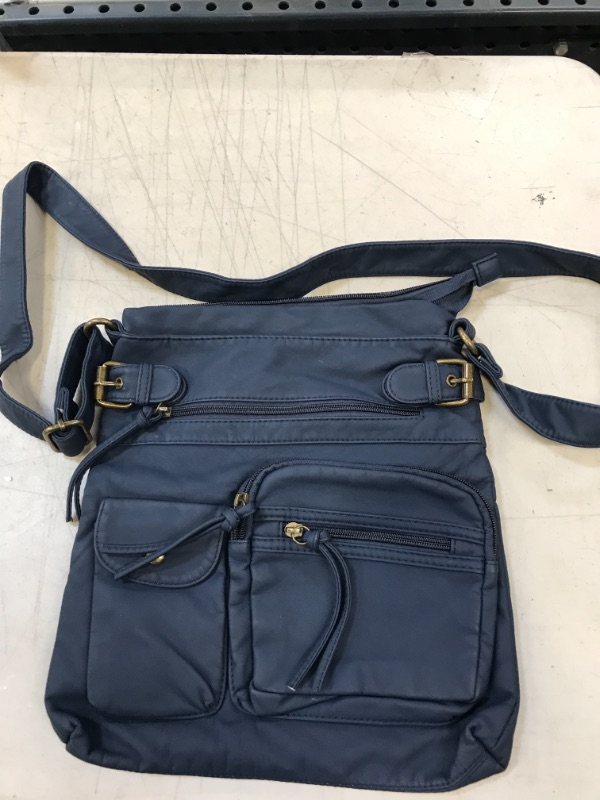 Photo 1 of BLUE PURSE WITH LONG STRAP 