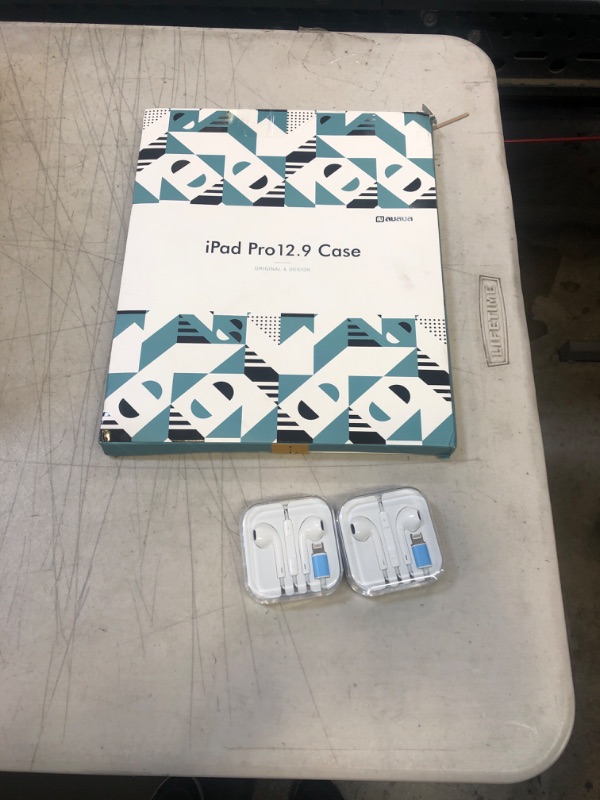 Photo 1 of 2 pairs of iphone headphones and ipad pro 12.9 case