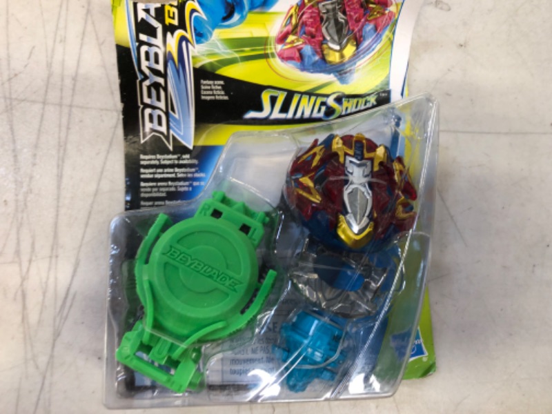 Photo 2 of BEYBLADE Burst Turbo Slingshock Xcalius X4 Starter Pack -- Battling Top and Right/Left-Spin Launcher, Age 8+