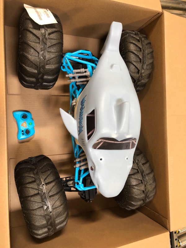 Photo 2 of Monster Jam, Official Mega Megalodon All-Terrain Remote Control Monster Truck, 1:6 Scale, Kids Toys for Boys and Girls Ages 4 and up
