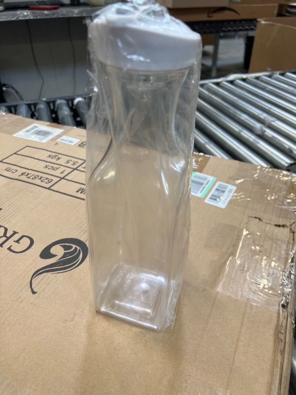 Photo 1 of 50oz clear liquid container