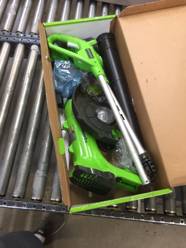 Photo 1 of Greenworks 24V Cordless String Trimmer and Blower Combo Pack with Extra Replacement Spools, 2Ah Battery and Charger Included