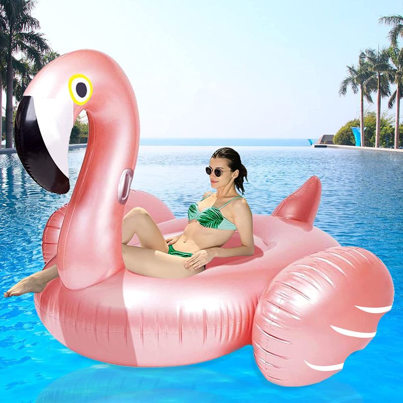 Photo 1 of Giant Inflatable Flamingo Ride On Pool Float, Blow Up Pool Floatie with Fast Valves Swimming Floating Raft, Lounge, Summer Party Decorations Toys for Kids Adults, Large 43 x 33 inch

