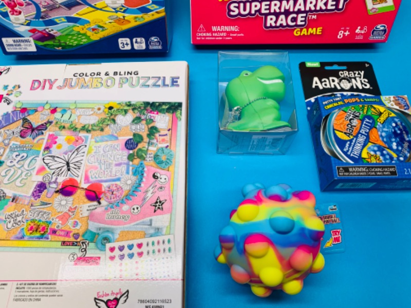 Photo 2 of 222639…Blue’s Clues, Mini Brands games, puzzles, putty, and more