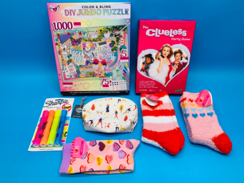 Photo 1 of 222647…jumbo puzzle, party game, fuzzy socks and more