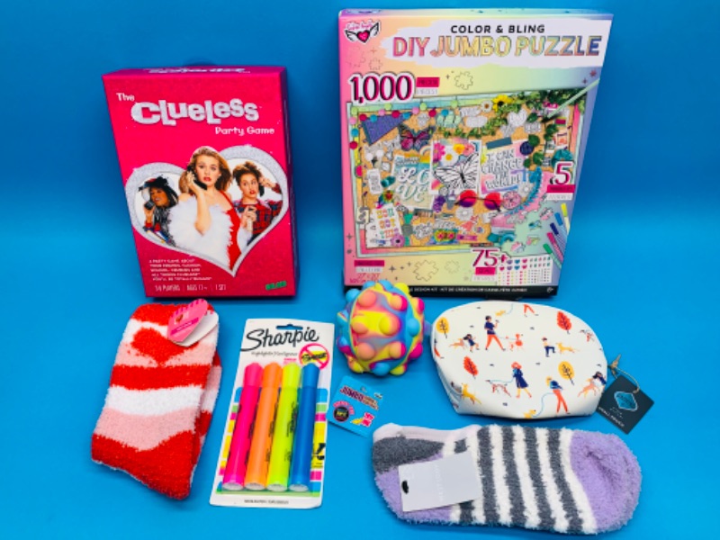 Photo 1 of 222648…party game, puzzle, fuzzy socks and more 