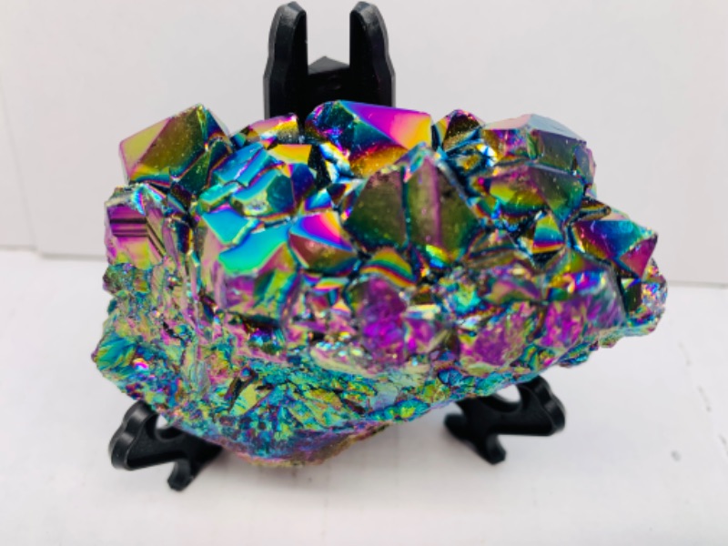 Photo 2 of 222659…3 x 3” electroplated rainbow titanium rock on stand 