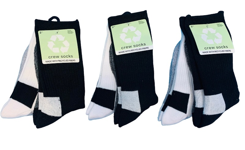 Photo 1 of 222975…  6 pairs of adult one size fits most crew socks made with recycled fibers