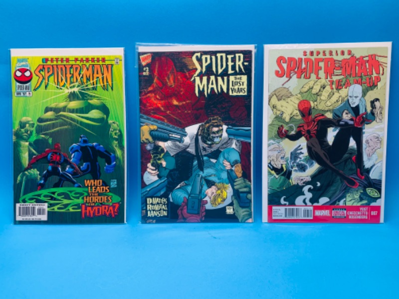 Photo 1 of 223015…3 Spider-Man comics in plastic sleeves 