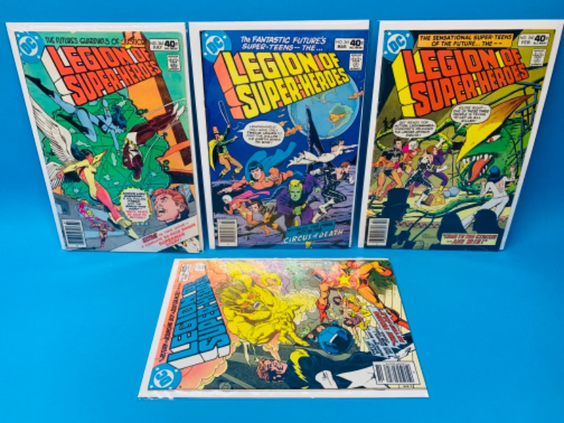 Photo 1 of 223016…4  vintage $.40 legion of superheroes comics in plastic sleeves