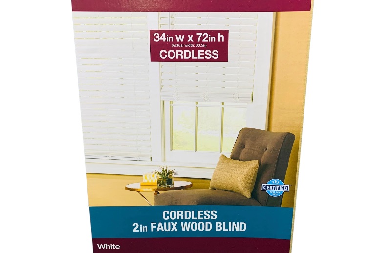 Photo 1 of 223087…  white 34 W x 72” L cordless room darkening faux wood window blind all hardware included 