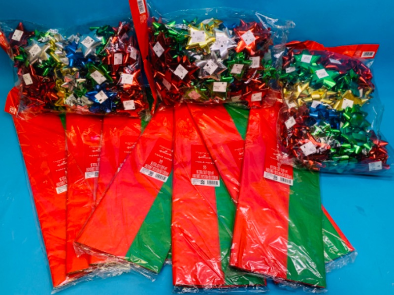 Photo 1 of 223126…245 sheets of tissue paper and 180 peel and stick bows for gift wrapping 