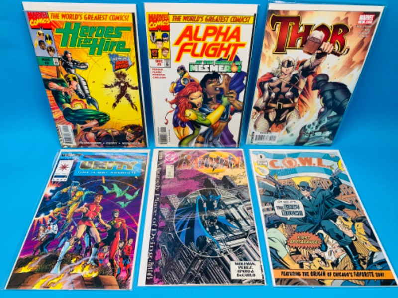 Photo 1 of 223524…6  comics in plastic sleeves 