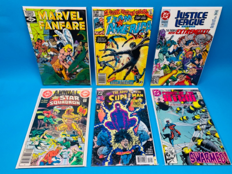 Photo 1 of 223554…6 older  comics in plastic sleeves 