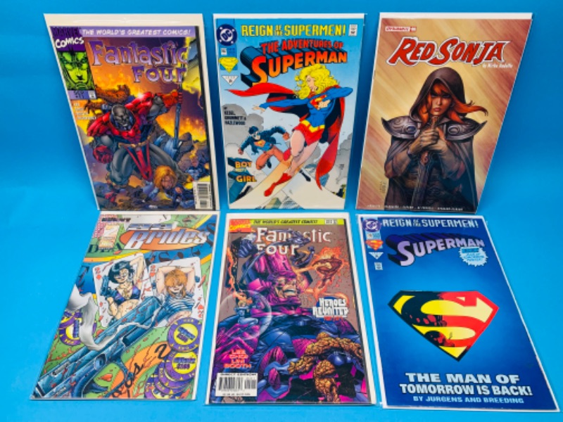 Photo 1 of 223558…6  comics in plastic sleeves 