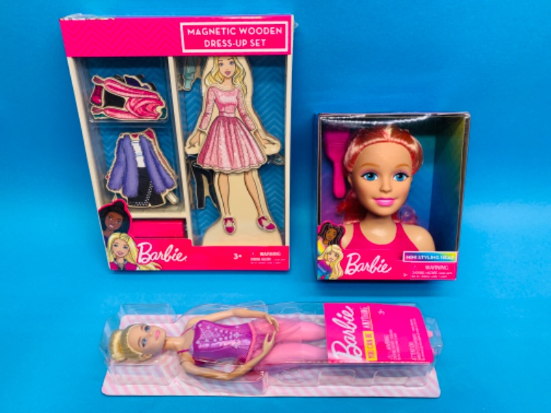 Photo 1 of 223619…Barbie doll, mini styling head, and wooden dress up toy