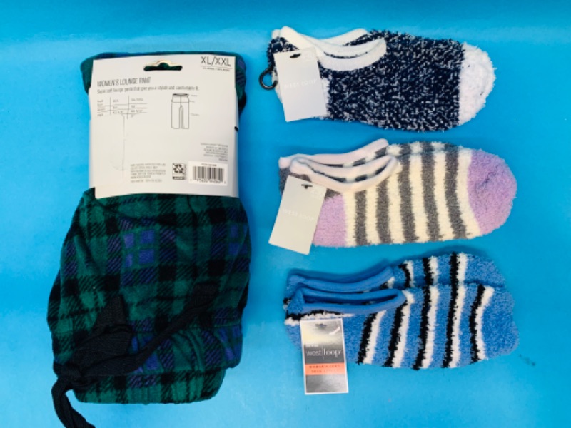 Photo 1 of 223871…size xl/xxl women’s lounge pants and 3 pairs of fuzzy socks 