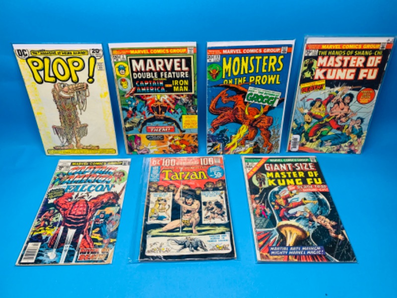 Photo 1 of 223907…condition issues-7 vintage comics in sleeves- bends, stains, wear