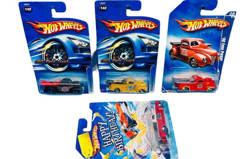 Photo 1 of 223938…4 hot wheels Ford die cast trucks 