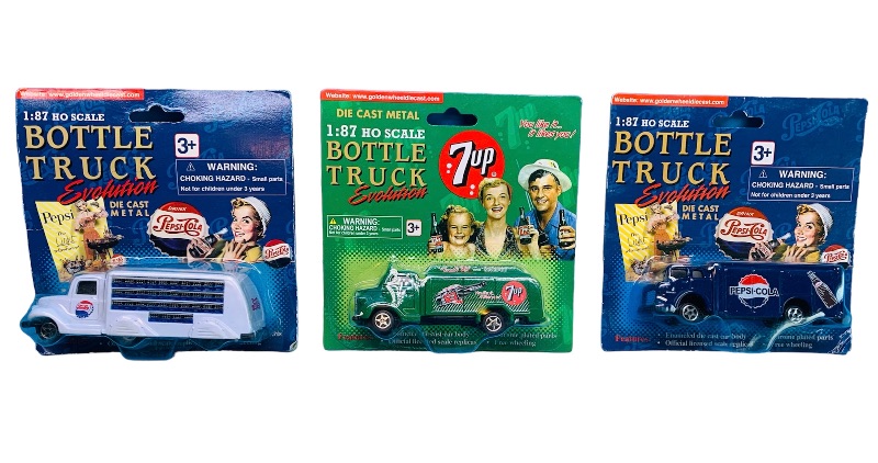 Photo 1 of 223943…3 die cast bottle trucks -some wear on packages 