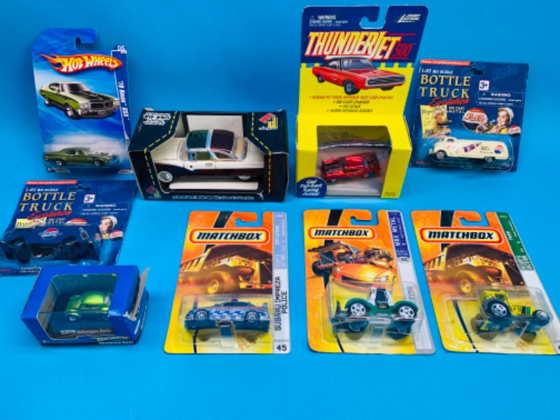 Photo 1 of 223946…damaged packages- die cast cars