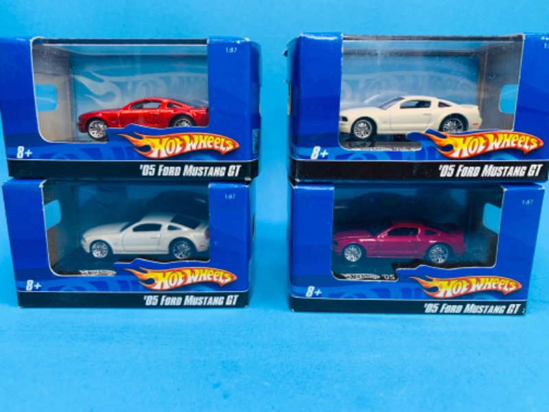 Photo 1 of 223951… 4 small die cast ford Mustang cars in display cases 